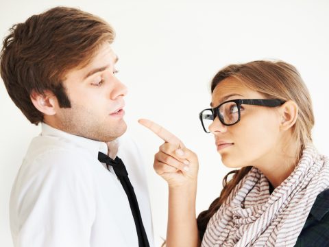 a woman speaking toman in non verbal manner